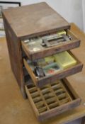 Watchmakers cabinet including crystals, movements,