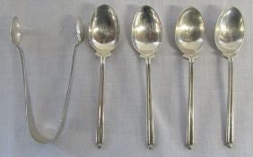 4 silver golfing teaspoons Sheffield 1957 & sugar tongs Birmingham 1892 total weight 1.