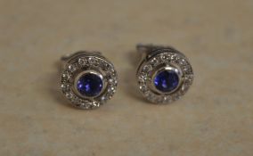 Pair of 18ct white gold sapphire and diamond earrings