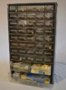 Small watchmakers cabinet approx half full of mixed parts