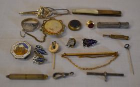 Trinkets including Goodyear pin badges, small silver ring,