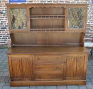 Oak dresser with linen fold panels