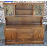 Oak dresser with linen fold panels