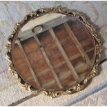 Round gilt mirror with bevelled edge