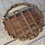 Round gilt mirror with bevelled edge