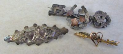 2 silver brooches Birmingham hallmarks & a small yellow metal brooch