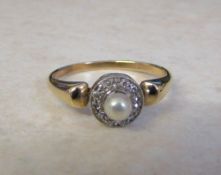 Tested as 9ct gold diamond and pearl ring size K