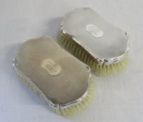 Pair of gents silver backed brushes London hallmark