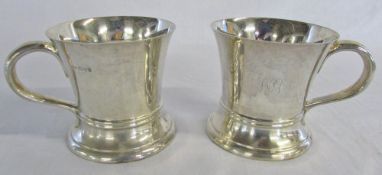 Pair of silver Smithfield tankards London 1929 weight 22.