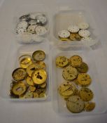 Quantity of pocket watch parts including movements, dials,