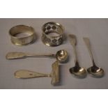 Silver condiment spoons, silver pusher and two silver napkin rings, total weight approx 2.
