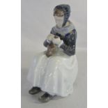 Royal Copenhagen figure of seated lady darning/sewing no 1317 H 23 cm