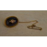 Tested as 9ct gold Victorian diamond and garnet brooch with safety chain