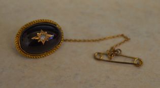 Tested as 9ct gold Victorian diamond and garnet brooch with safety chain