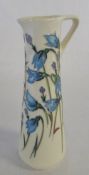 Moorcroft jug with blue flowers 2012 H 19 cm