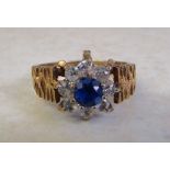 9ct gold ring with spinel stones size K/L (total weight 3 g)