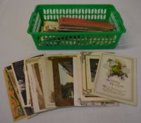 Small bundle of postcards and cigarette cards