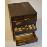 Small cabinet of watchmakers parts