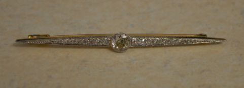 Tested as 18ct gold brooch with large central diamond,