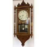 Tunbridge ware wall clock with 8 day strike on bell movement & carved pediment