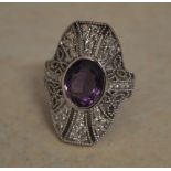 Tested as 18ct white gold oversized amethyst and diamond ring,