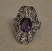 Tested as 18ct white gold oversized amethyst and diamond ring,