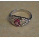 18ct white gold pink sapphire ring with ornate diamond shoulders,