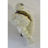 Large Michelin man figure with blue and yellow band H 45 cm