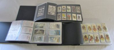 3 modern cigarette card albums containing full and part sets and type cards (over 1300 cards)
