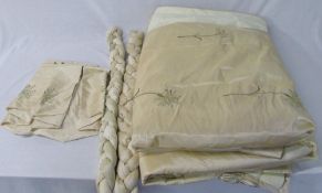 Pair of fully lined cream/gold curtains (drop approx 180 cm) with tie backs etc