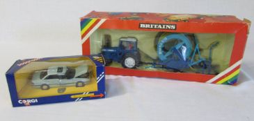 Corgi 'Rover Sterling' & a Britains 9600 'Ford Tractor and hose drum irrigator'