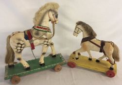 2 painted child's pulling horses