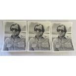 3 black and white hand signed photographs of Jackie Stewart