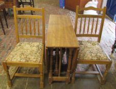 Drop leaf table and two chairs