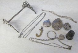 Various silver inc pendants, necklaces, thimble, knife rest etc total weight 1.