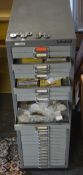 A large Bisley cabinet full of watch parts, movements,