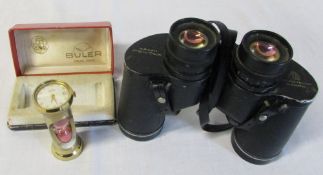 Pair of Pentax binoculars and a Buler calendar watch/brass hour glass stand