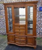 Modern bow fronted display cabinet