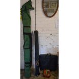 Various fishing equipment including rods,