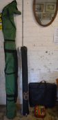 Various fishing equipment including rods,