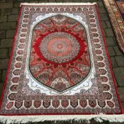 Red ground woven silk rug with traditional Shabah design 6ft by 4ft