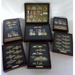 7 cased sets of replica medals,