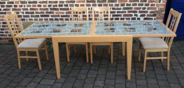 Draw leaf glass top table with 4 chairs extending to 2.4m by 0.