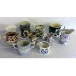 10 19th century jugs & tankards including a motto mug with a lizard & frog on inside (A/F)