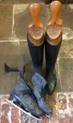 Leather riding boots with vintage wooden boot trees,