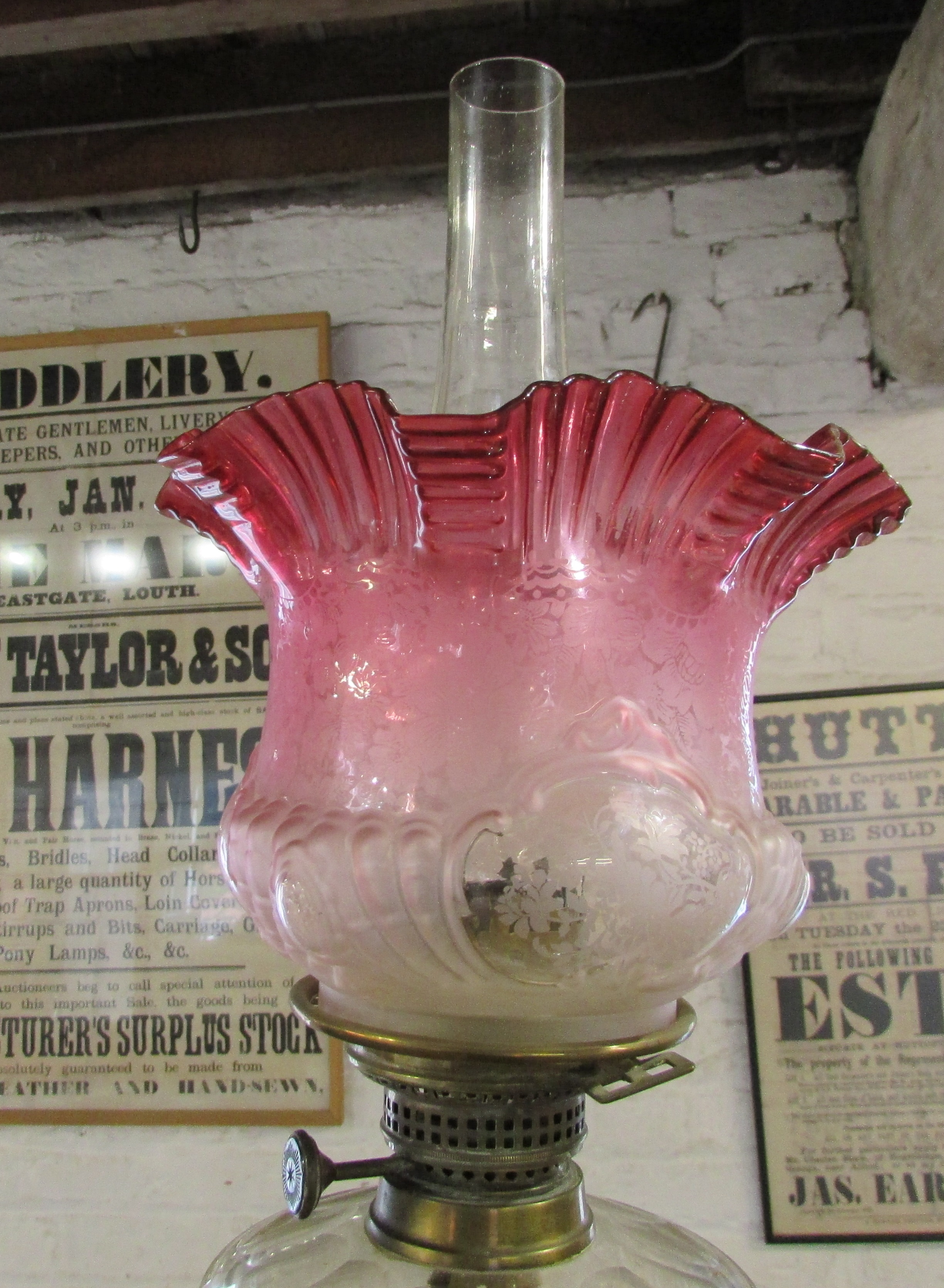 Victorian paraffin lamp on a brass column with a cranberry glass shade - Image 4 of 8