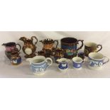 Collection of 19th century copper lustre jugs & tankards & 4 pieces of blue & white pottery with