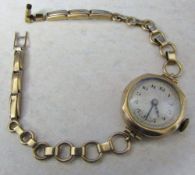 Ladies 9ct gold vintage watch and strap total weight (inc of movement) 12.