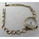 Ladies 9ct gold vintage watch and strap total weight (inc of movement) 12.