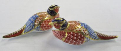 Royal Crown Derby paperweights of two pheasants both with gold stoppers (one beak chipped) L 18 cm